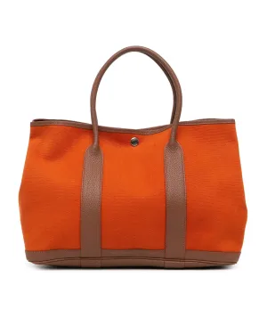 Canvas and Leather Trim Tote with Snap Closure